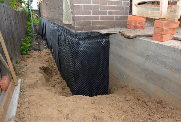 Happy homeowners after waterproofing job in Fairfield